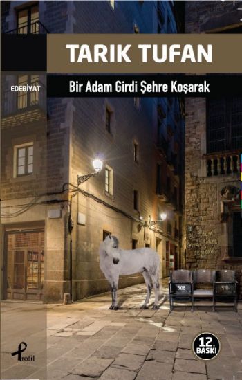 Bir Adam Girdi Şehre Koşarak