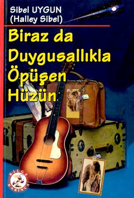 Biraz da Duygusallıkla Öpüşen Hüzün